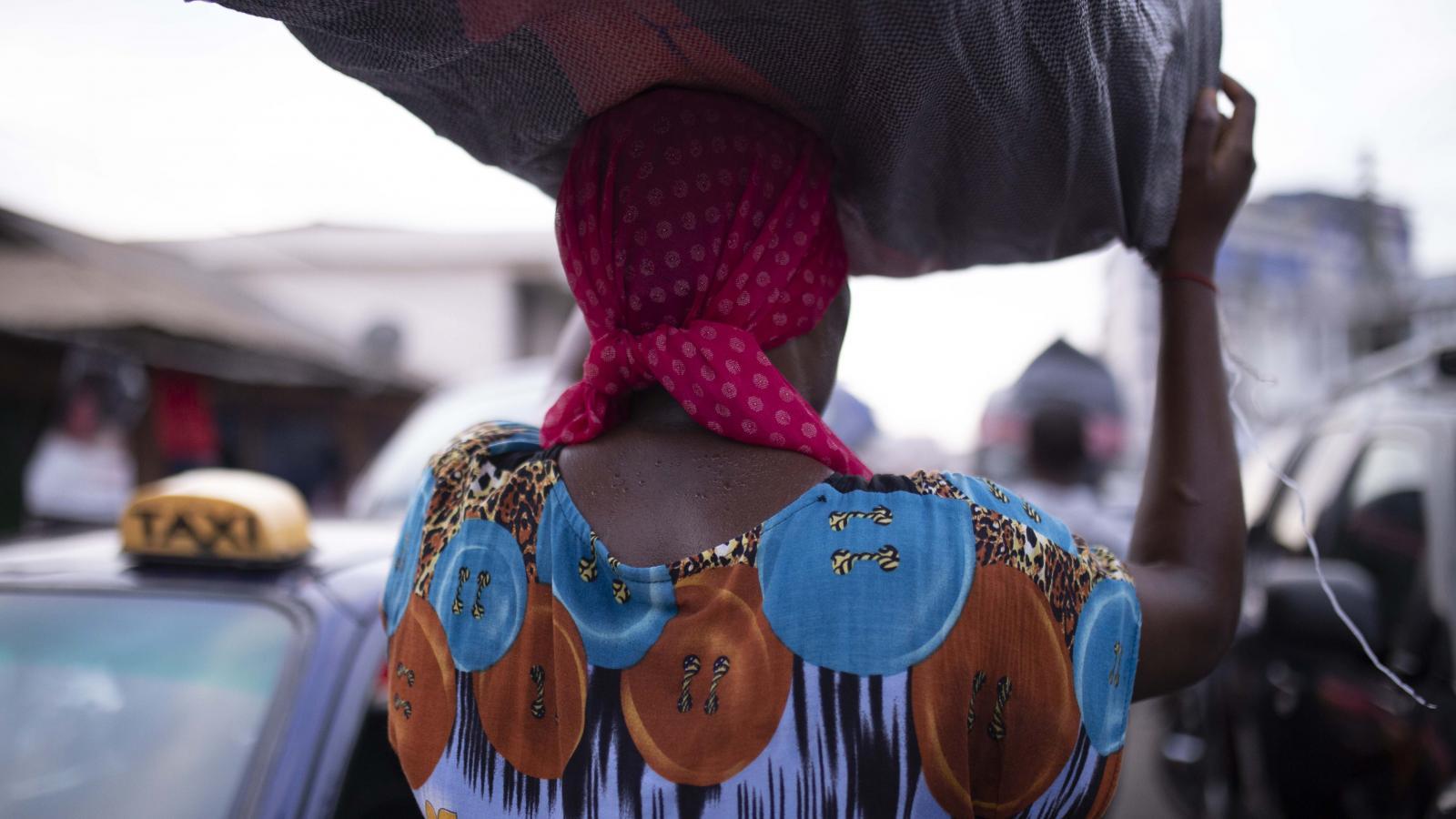 Teen Vogue | When You Donate Clothing These Women Carry the Load